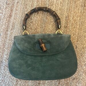 Elegant Green Suede Handbag with Bamboo Handle